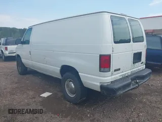 2001 Ford Econoline Cargo with VIN 1FTNE24LX1HB17529, listed as a IAAI auction lot 42002967 with 309,605 mi miles and . Bid and sale history available at DreamBid. Image 3.