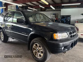 2002 Isuzu Rodeo S с VIN 4S2CK58W124336947, выставлен на аукционе Copart как лот 63482935 с пробегом 248 008 миль миль и Чистый • Clean title. История ставок и продаж доступна на DreamBid. Изображение 1.