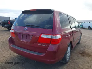 2005 Honda Odyssey LX with VIN 5FNRL38235B121653, listed as a IAAI auction lot 41704670 with 263,160 mi miles. Bid and sale history available at carsss.com. Image 4.