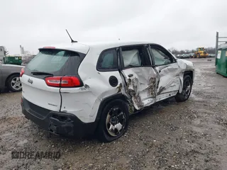 2014 Jeep Cherokee Sport with VIN 1C4PJMAB3EW287020, listed as a IAAI auction lot 41040643 with 134,417 mi miles. Bid and sale history available at carsss.com. Image 4.