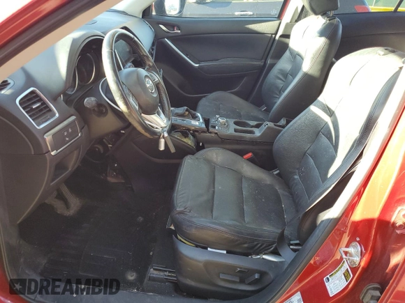 2016 Mazda CX-5 Grand Touring z VIN JM3KE4DY9G0753691, wystawiony jako Copart lot #57361645 z przebiegiem 90 733 mil mil oraz Szkoda całkowita • Salvage title. Historia ofert i sprzedaży dostępna na DreamBid. Obrazek 7.