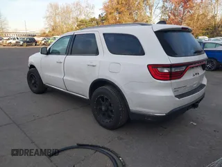 2015 Dodge Durango SXT with VIN 1C4RDJAG1FC745974, listed as a IAAI auction lot 41392820 with 124,861 mi miles and . Bid and sale history available at DreamBid. Image 3.