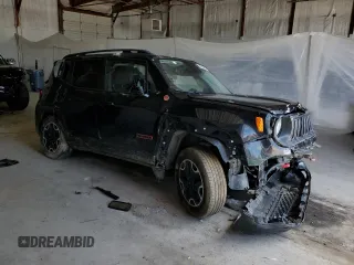 2017 Jeep Renegade Trailhawk with VIN ZACCJBCB9HPE56121, listed as a Copart auction lot 55655485 with 127,661 mi miles and Salvage title. Bid and sale history available at DreamBid. Image 4.