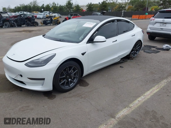 2023 Tesla Model 3 with VIN 5YJ3E1EA5PF505856, listed as a IAAI auction lot 41885837 with 28,206 mi miles and . Bid and sale history available at carsss.com. Image 16.