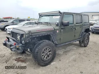2015 Jeep Wrangler Unlimited Rubicon Hard Rock z VIN 1C4HJWFG8FL681796, wystawiony jako Copart lot #56391915 z przebiegiem 74 529 mil mil oraz Szkoda całkowita • Salvage title. Historia ofert i sprzedaży dostępna na DreamBid. Obrazek 1.