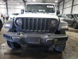 2022 Jeep Wrangler Unlimited Willys with VIN 1C4HJXDM7NW244562, listed as a Copart auction lot 79667744 with 47,157 mi miles and Salvage Title. Bid and sale history available at DreamBid. Image 5.