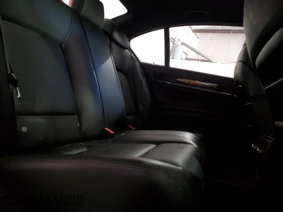 2011 BMW 7 Series with VIN WBAKX6C50BC197118, listed as a Copart auction lot 73686234 with 166,393 mi miles and Clean title. Bid and sale history available at DreamBid. Image 10.
