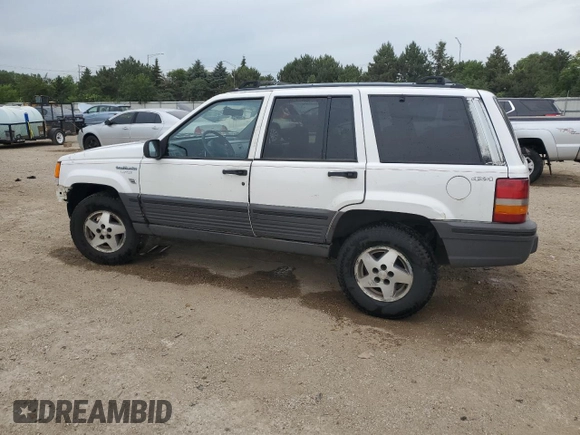 1995 Jeep Grand Cherokee Laredo z VIN 1J4GZ58S2SC578183, wystawiony jako Copart lot #61665955 z przebiegiem 341 135 mil mil oraz Szkoda całkowita • Salvage title. Historia ofert i sprzedaży dostępna na DreamBid. Obrazek 2.