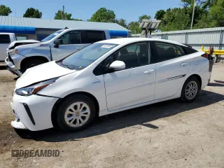 2020 Toyota Prius L Eco z VIN JTDKARFU4L3124022, wystawiony jako Copart lot #56243885 z przebiegiem 24 385 mil mil oraz Szkoda całkowita • Salvage title. Historia ofert i sprzedaży dostępna na DreamBid. Obrazek 1.