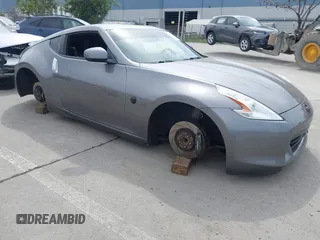 2012 Nissan 370Z Touring with VIN JN1AZ4EH4CM561415, listed as a IAAI auction lot 41838948 with 111,298 mi miles. Bid and sale history available at carsss.com. Image 1.