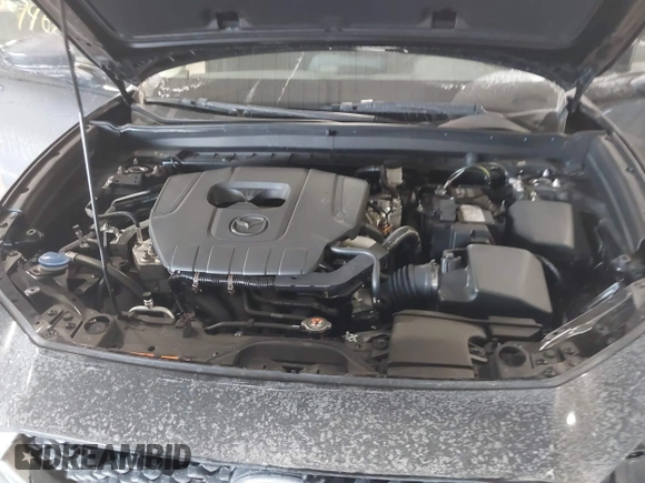 2024 Mazda CX-30 S Carbon Edition with VIN 3MVDMBCM6RM638150, listed as a IAAI auction lot 41369467 with 1,197 mi miles and . Bid and sale history available at DreamBid. Image 10.