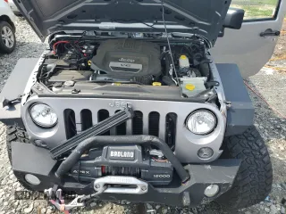 2018 Jeep Wrangler JK Unlimited Sport S with VIN 1C4HJWDG8JL925782, listed as a Copart auction lot 65468664 with 68,075 mi miles and Salvage Title. Bid and sale history available at carsss.com. Image 12.