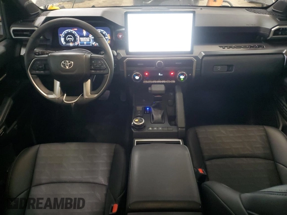 2024 Toyota Tacoma SR5 z VIN 3TMLB5JN6RM060647, wystawiony jako Copart lot #53515055 z przebiegiem 7 240 mil mil oraz Szkoda całkowita • Salvage title. Historia ofert i sprzedaży dostępna na DreamBid. Obrazek 8.
