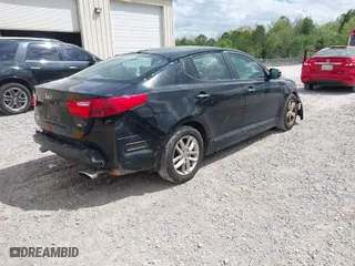 2015 Kia Optima LX with VIN 5XXGM4A77FG487033, listed as a IAAI auction lot 41974724 with 173,451 mi miles. Bid and sale history available at carsss.com. Image 4.