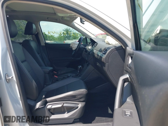 2018 Volkswagen Tiguan SEL z VIN 3VV2B7AX6JM195125, wystawiony jako IAAI lot #42523047 z przebiegiem 73 926 mil mil oraz . Historia ofert i sprzedaży dostępna na DreamBid. Obrazek 5.