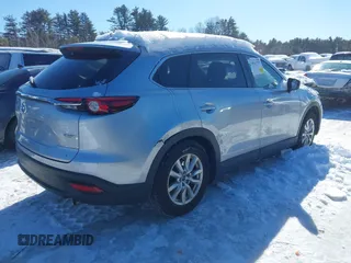 2016 Mazda CX-9 Sport with VIN JM3TCBBYXG0117878, listed as a IAAI auction lot 41617757 with 114,231 mi miles. Bid and sale history available at carsss.com. Image 4.