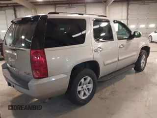 2007 GMC Yukon SLT with VIN 1GKFK13007R253674, listed as a IAAI auction lot 41683159 with 207,778 mi miles. Bid and sale history available at carsss.com. Image 4.