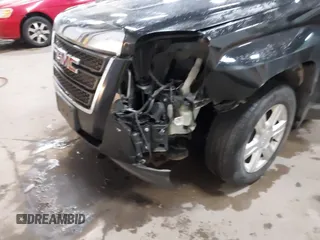 2015 GMC Terrain SLE z VIN 2GKALMEKXF6295318, wystawiony jako IAAI lot #41039353 z przebiegiem 158 149 mil mil oraz . Historia ofert i sprzedaży dostępna na DreamBid. Obrazek 6.