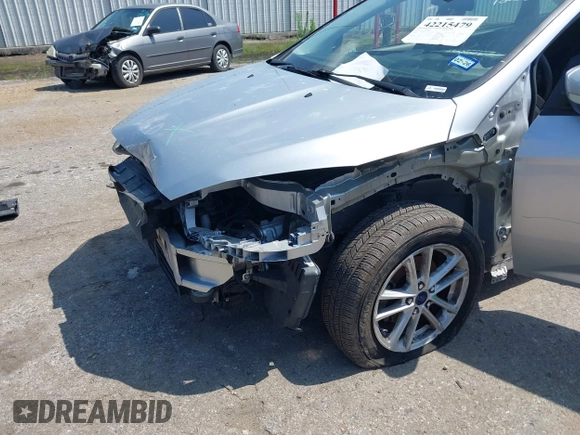 2017 Ford Focus SE with VIN 1FADP3F2XHL256136, listed as a IAAI auction lot 42215479 with 89,945 mi miles and . Bid and sale history available at DreamBid. Image 6.