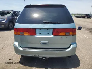2004 Honda Odyssey EX-L with VIN 5FNRL18014B015462, listed as a Copart auction lot 62834665 with 323,817 mi miles and Salvage title. Bid and sale history available at DreamBid. Image 6.