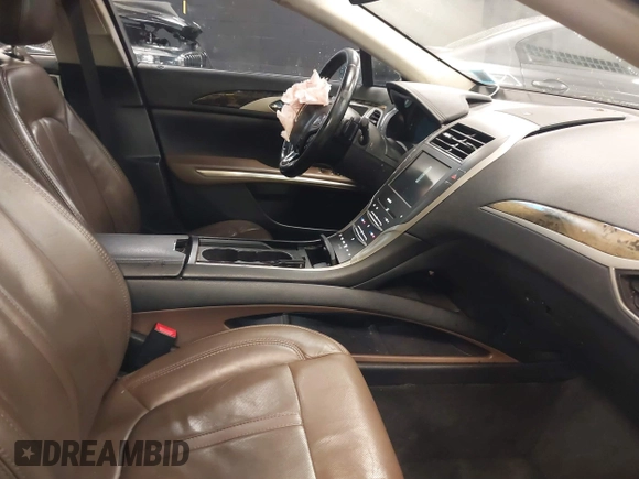 2016 Lincoln MKZ with VIN 3LN6L2JK2GR603504, listed as a IAAI auction lot 41020438 with 119,648 mi miles and . Bid and sale history available at DreamBid. Image 5.