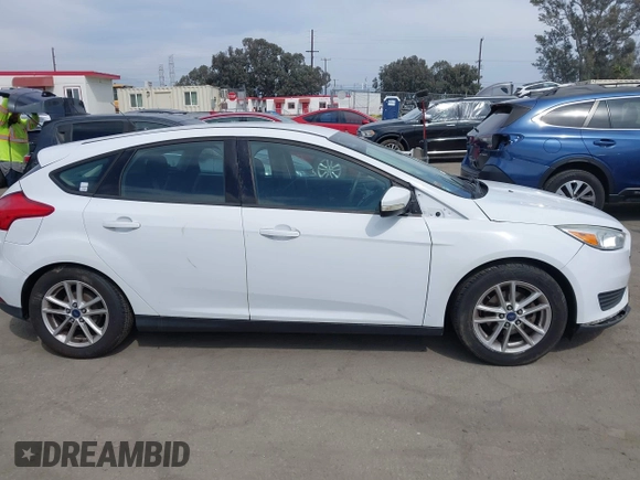 2015 Ford Focus SE with VIN 1FADP3K22FL315960, listed as a IAAI auction lot 41968426 with 184,726 mi miles. Bid and sale history available at carsss.com. Image 13.