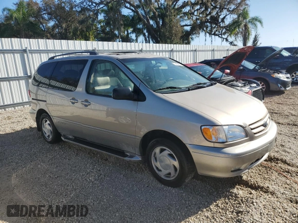 2002 Toyota Sienna LE with VIN 4T3ZF13C62U495093, listed as a Copart auction lot 73634214 with 61,290 mi miles and Salvage Title. Bid and sale history available at carsss.com. Image 4.