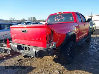 2016 Toyota Tundra 4WD Truck SR with VIN 5TFUM5F16GX064645, listed as a IAAI auction lot 41614790 with 144,400 mi miles. Bid and sale history available at carsss.com. Image 4.
