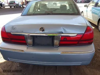 2004 Mercury Grand Marquis GS with VIN 2MEFM74W24X690149, listed as a IAAI auction lot 41842464 with 118,776 mi miles. Bid and sale history available at carsss.com. Image 6.
