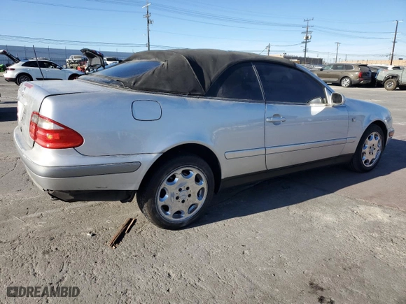 1999 Mercedes-Benz CLK-Class with VIN WDBLK65G2XT024808, listed as a Copart auction lot 85336294 with 289,898 mi miles and Salvage Title. Bid and sale history available at carsss.com. Image 3.