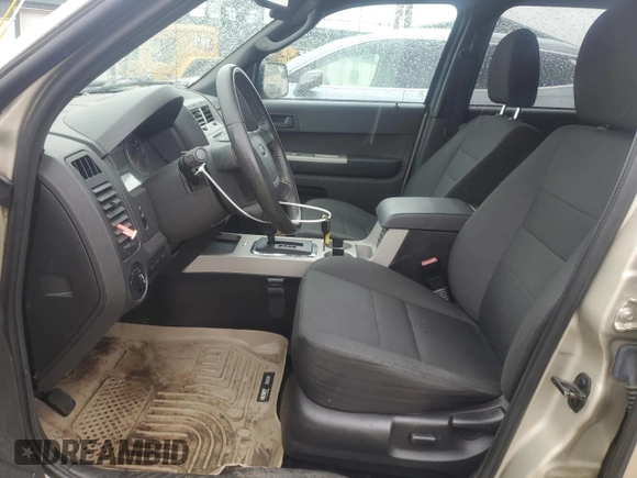 2012 Ford Escape XLT with VIN 1FMCU9D76CKC44981, listed as a Copart auction lot 57908795 with 127,594 mi miles and Salvage title. Bid and sale history available at DreamBid. Image 7.
