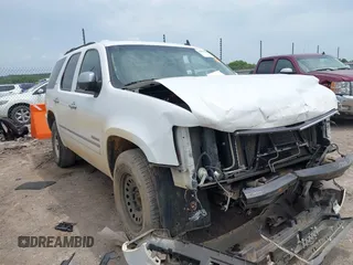 2012 Chevrolet Tahoe LTZ with VIN 1GNSCCE00CR197950, listed as a IAAI auction lot 42393693 with 296,161 mi miles and . Bid and sale history available at DreamBid. Image 1.