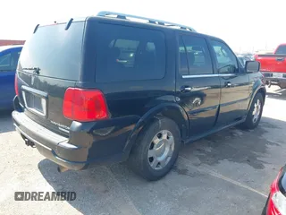 2005 Lincoln Navigator Luxury with VIN 5LMFU27535LJ22782, listed as a IAAI auction lot 41682533 with 244,287 mi miles. Bid and sale history available at carsss.com. Image 4.