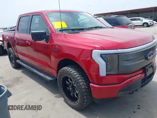 2023 Ford F-150 Lightning Pro with VIN 1FTVW1EL8PWG33656, listed as a IAAI auction lot 42260659 with 22,490 mi miles and . Bid and sale history available at DreamBid. Image 1.