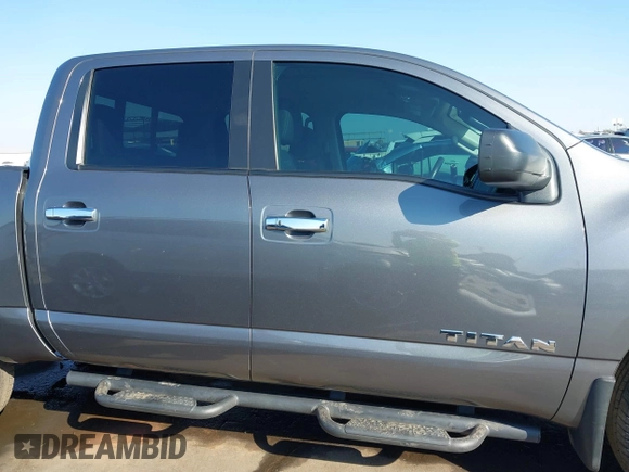 2021 Nissan Titan SV with VIN 1N6AA1EF2MN504611, listed as a IAAI auction lot 41469990 with 81,432 mi miles and . Bid and sale history available at DreamBid. Image 14.