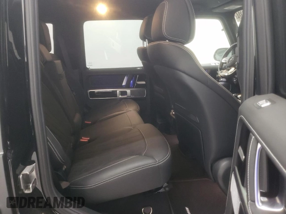 2022 Mercedes-Benz G 63 AMG with VIN W1NYC7HJ2NX444083, listed as a Copart auction lot 64764324 with 7,909 mi miles and Salvage title. Bid and sale history available at DreamBid. Image 11.