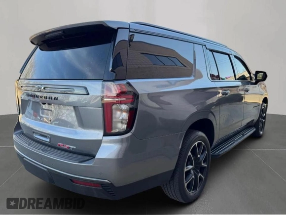 2021 Chevrolet Suburban RST with VIN 1GNSKEKD9MR358433, listed as a Copart auction lot 56817195 with 216,827 mi miles and Clean Title. Bid and sale history available at DreamBid. Image 4.