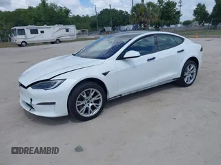 2022 Tesla Model S Plaid with VIN 5YJSA1E6XNF473888, listed as a IAAI auction lot 42141141 with 28,584 mi miles and . Bid and sale history available at carsss.com. Image 19.