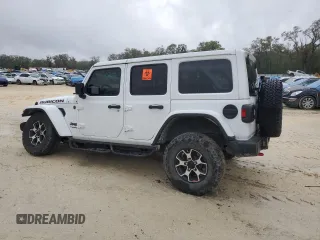 2022 Jeep Wrangler Unlimited Rubicon with VIN 1C4HJXFNXNW133624, listed as a Copart auction lot 48222615 with 51,849 mi miles and Salvage title. Bid and sale history available at DreamBid. Image 2.