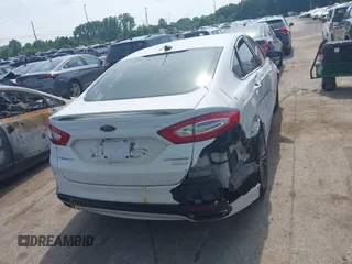 2016 Ford Fusion Titanium with VIN 3FA6P0K99GR317034, listed as a IAAI auction lot 42590288 with 200,468 mi miles and . Bid and sale history available at DreamBid. Image 16.