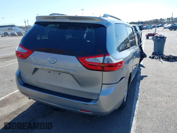 2015 Toyota Sienna LE AAS with VIN 5TDKK3DC0FS663826, listed as a IAAI auction lot 42050229 with 126,971 mi miles and . Bid and sale history available at DreamBid. Image 4.