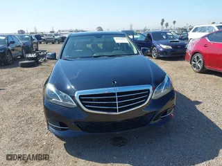 2015 Mercedes-Benz E-Class E 250 BlueTEC Luxury with VIN WDDHF0EB5FB120603, listed as a IAAI auction lot 41836068 with 112,264 mi miles. Bid and sale history available at carsss.com. Image 13.