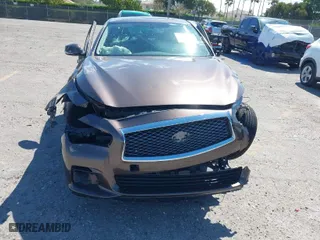 2015 Infiniti Q50 Premium with VIN JN1BV7AR4FM395093, listed as a IAAI auction lot 41907653 with 138,319 mi miles. Bid and sale history available at carsss.com. Image 6.