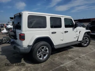 2019 Jeep Wrangler Unlimited Sahara with VIN 1C4HJXEN0KW521751, listed as a Copart auction lot 50650025 with 75,640 mi miles and Salvage Title. Bid and sale history available at DreamBid. Image 3.