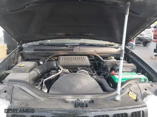 2005 Jeep Grand Cherokee Laredo with VIN 1J4HR48N75C647740, listed as a IAAI auction lot 41803160 with 145,147 mi miles. Bid and sale history available at carsss.com. Image 10.