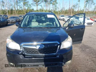 2014 Subaru Forester 2.5i Touring with VIN JF2SJAMC1EH452856, listed as a IAAI auction lot 41801406 with 148,342 mi miles. Bid and sale history available at carsss.com. Image 6.