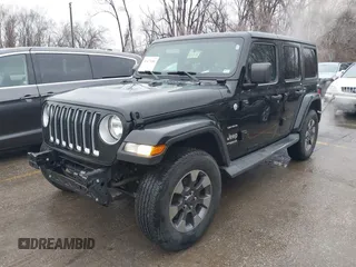 2018 Jeep Wrangler Unlimited Sahara z VIN 1C4HJXEN6JW332956, wystawiony jako IAAI lot #41477681 z przebiegiem 97 446 mil mil oraz . Historia ofert i sprzedaży dostępna na DreamBid. Obrazek 18.