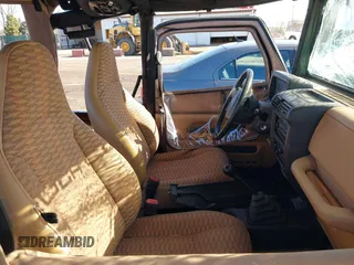 1998 Jeep Wrangler SE with VIN 1J4FY29P6WP709203, listed as a IAAI auction lot 41962877 with 1 mi miles. Bid and sale history available at carsss.com. Image 5.