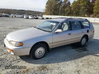 1996 Toyota Camry z VIN 4T1EG12K8TU779386, wystawiony jako Copart lot #79189014 z przebiegiem 142 891 mil mil oraz Czysty tytuł • Clean title. Historia ofert i sprzedaży dostępna na DreamBid. Obrazek 1.
