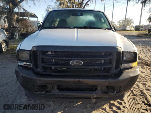 2003 Ford F-250 XL with VIN 1FTNX20L73EC70163, listed as a Copart auction lot 77061204 with 387,321 mi miles and Salvage title. Bid and sale history available at DreamBid. Image 5.